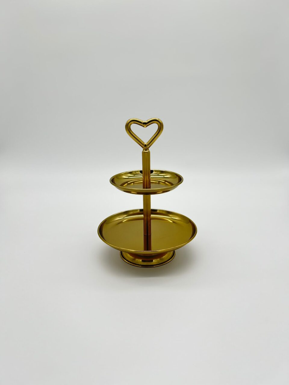 Goldene Etagere mit Herzgriff