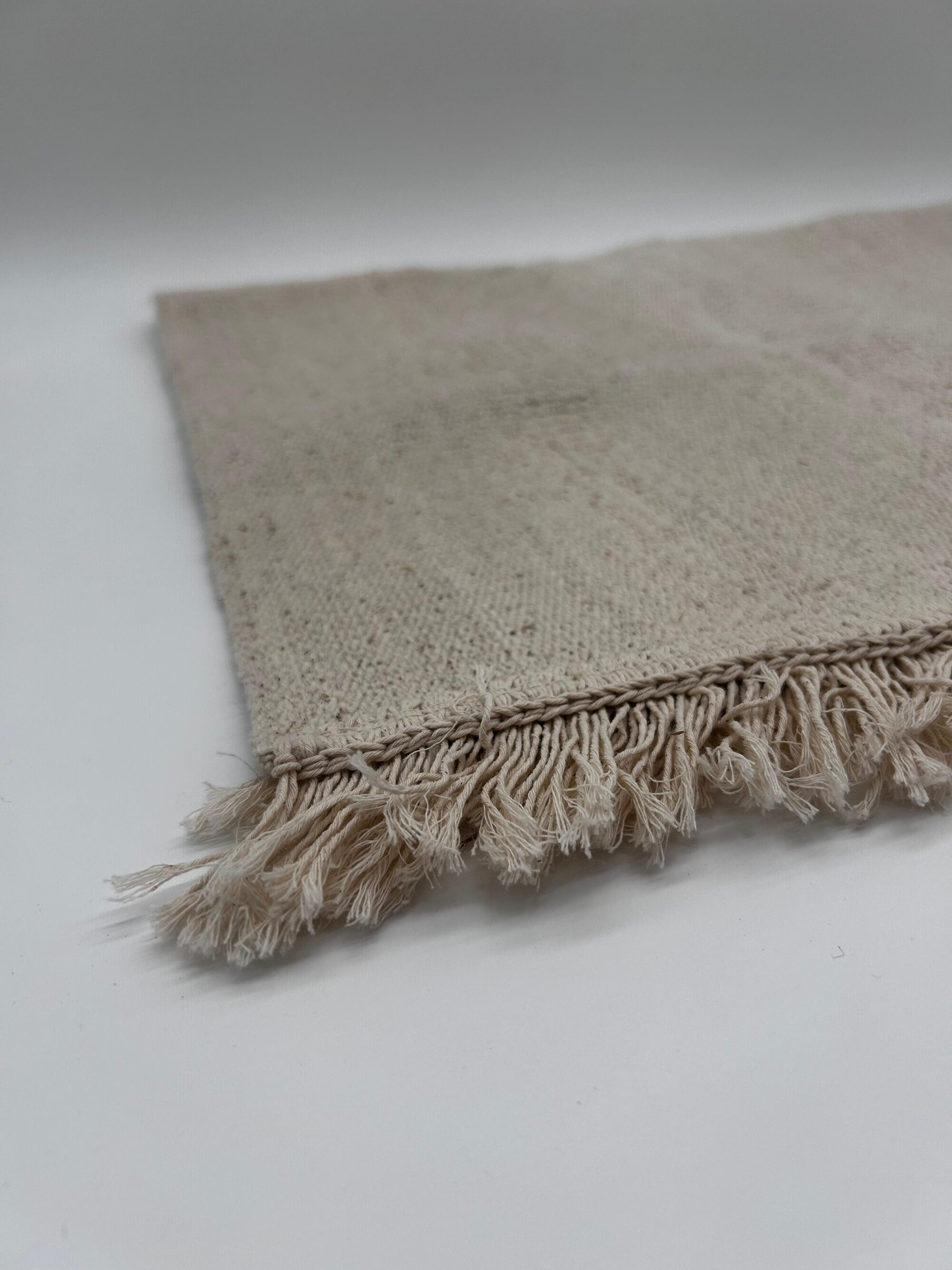 Fransenteppich beige